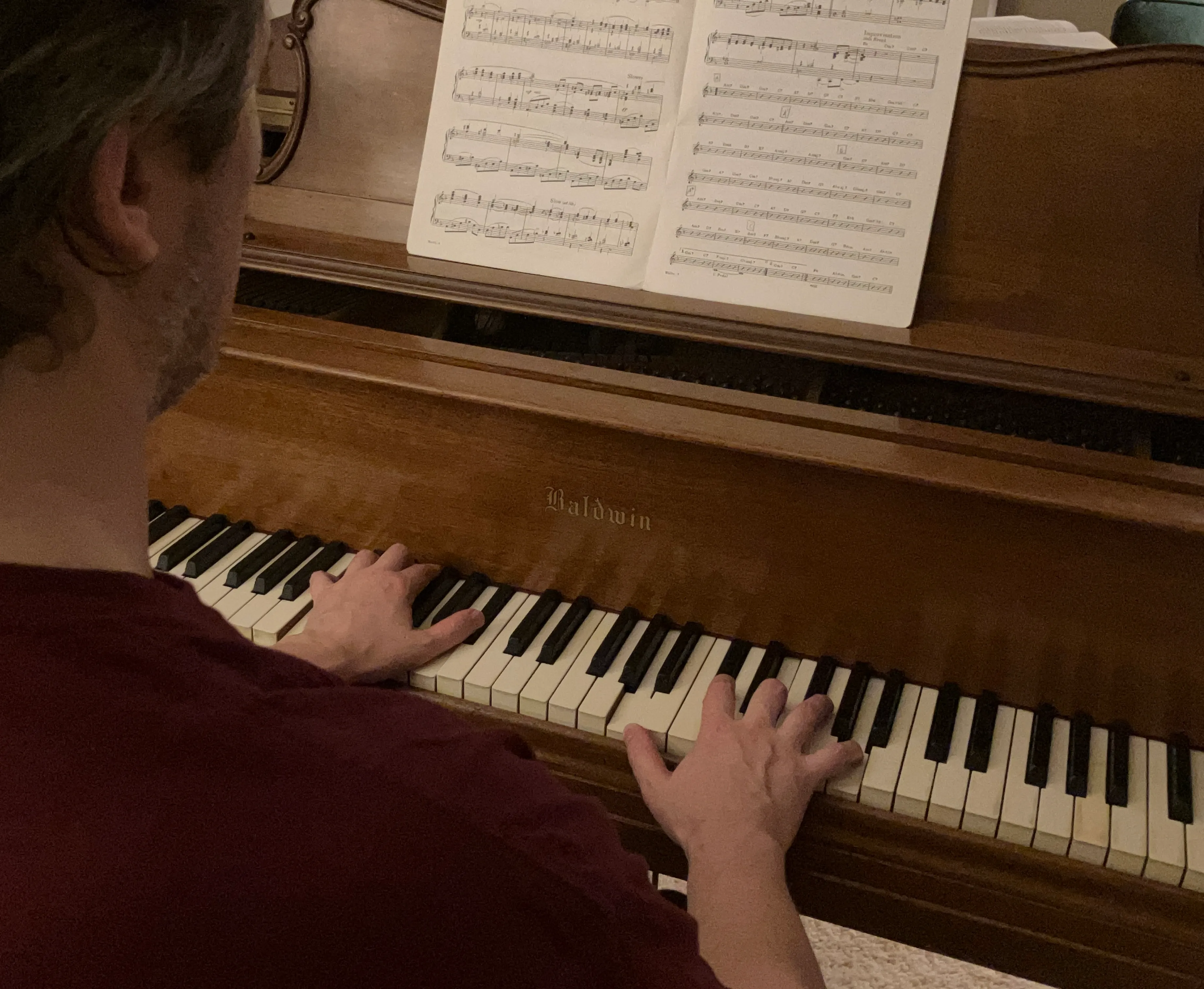 Image of student playing the piano